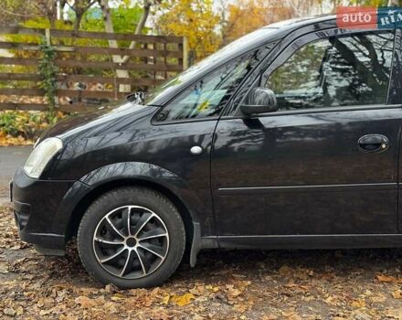 Черный Опель Мерива, объемом двигателя 1.6 л и пробегом 262 тыс. км за 4740 $, фото 15 на Automoto.ua