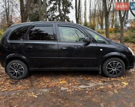 Черный Опель Мерива, объемом двигателя 1.6 л и пробегом 262 тыс. км за 4100 $, фото 4 на Automoto.ua