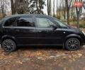 Черный Опель Мерива, объемом двигателя 1.6 л и пробегом 262 тыс. км за 4100 $, фото 4 на Automoto.ua