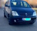 Черный Опель Мерива, объемом двигателя 1.3 л и пробегом 40000 тыс. км за 4900 $, фото 1 на Automoto.ua
