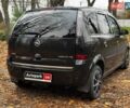 Черный Опель Мерива, объемом двигателя 1.6 л и пробегом 262 тыс. км за 4740 $, фото 9 на Automoto.ua