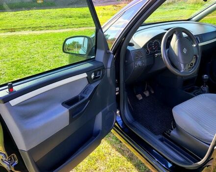 Черный Опель Мерива, объемом двигателя 1.4 л и пробегом 184 тыс. км за 5000 $, фото 9 на Automoto.ua