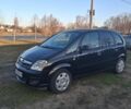 Черный Опель Мерива, объемом двигателя 1.36 л и пробегом 286 тыс. км за 4300 $, фото 1 на Automoto.ua