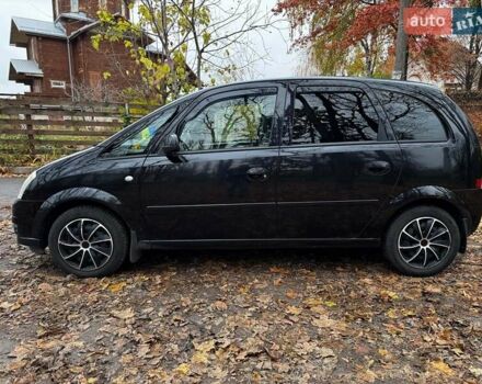 Черный Опель Мерива, объемом двигателя 1.6 л и пробегом 262 тыс. км за 4740 $, фото 14 на Automoto.ua