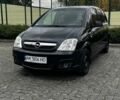 Черный Опель Мерива, объемом двигателя 1.36 л и пробегом 257 тыс. км за 2800 $, фото 1 на Automoto.ua