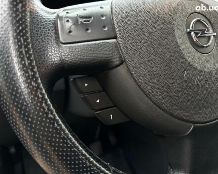 Черный Опель Мерива, объемом двигателя 1.6 л и пробегом 262 тыс. км за 4740 $, фото 25 на Automoto.ua