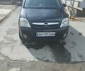 Черный Опель Мерива, объемом двигателя 1.4 л и пробегом 270 тыс. км за 4100 $, фото 1 на Automoto.ua