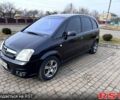 Черный Опель Мерива, объемом двигателя 1.6 л и пробегом 255 тыс. км за 3100 $, фото 1 на Automoto.ua