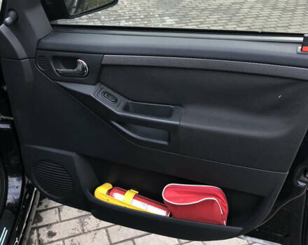 Черный Опель Мерива, объемом двигателя 1.25 л и пробегом 197 тыс. км за 3650 $, фото 10 на Automoto.ua