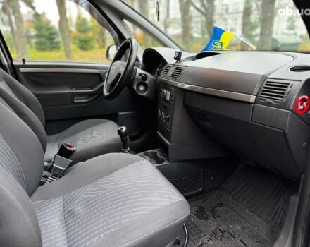 Черный Опель Мерива, объемом двигателя 1.6 л и пробегом 262 тыс. км за 4740 $, фото 30 на Automoto.ua