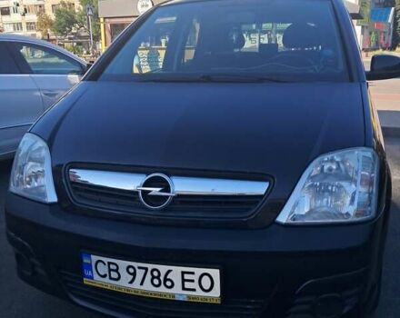 Черный Опель Мерива, объемом двигателя 1.6 л и пробегом 262 тыс. км за 4100 $, фото 3 на Automoto.ua