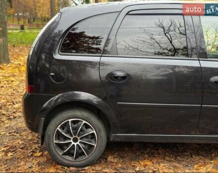 Черный Опель Мерива, объемом двигателя 1.6 л и пробегом 262 тыс. км за 4100 $, фото 7 на Automoto.ua