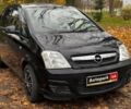 Черный Опель Мерива, объемом двигателя 1.6 л и пробегом 262 тыс. км за 4740 $, фото 3 на Automoto.ua