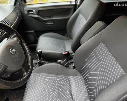 Черный Опель Мерива, объемом двигателя 1.6 л и пробегом 262 тыс. км за 4740 $, фото 24 на Automoto.ua