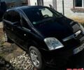 Черный Опель Мерива, объемом двигателя 1.6 л и пробегом 300 тыс. км за 4300 $, фото 1 на Automoto.ua