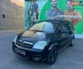 Черный Опель Мерива, объемом двигателя 1.6 л и пробегом 121 тыс. км за 5999 $, фото 1 на Automoto.ua