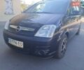 Черный Опель Мерива, объемом двигателя 1.6 л и пробегом 262 тыс. км за 4100 $, фото 1 на Automoto.ua