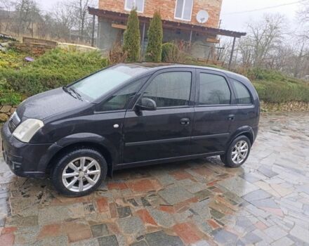 Черный Опель Мерива, объемом двигателя 1.6 л и пробегом 204 тыс. км за 3800 $, фото 1 на Automoto.ua