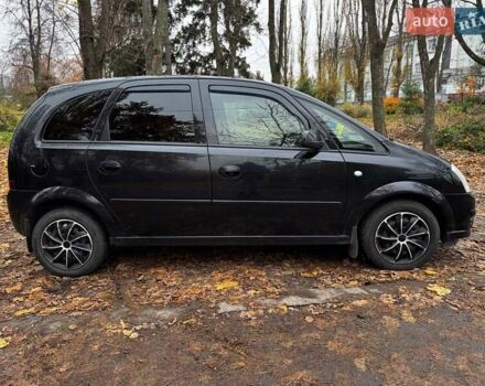 Черный Опель Мерива, объемом двигателя 1.6 л и пробегом 262 тыс. км за 4740 $, фото 6 на Automoto.ua