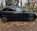 Черный Опель Мерива, объемом двигателя 1.6 л и пробегом 262 тыс. км за 4740 $, фото 6 на Automoto.ua
