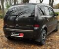 Черный Опель Мерива, объемом двигателя 1.6 л и пробегом 262 тыс. км за 4740 $, фото 9 на Automoto.ua