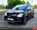 Черный Опель Мерива, объемом двигателя 1.6 л и пробегом 310 тыс. км за 3500 $, фото 1 на Automoto.ua