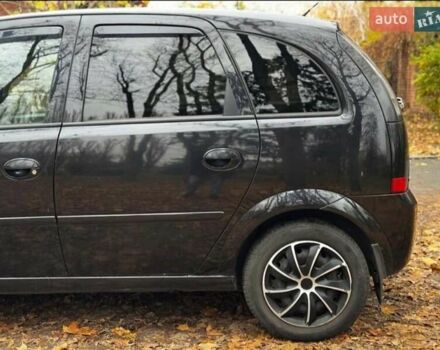 Черный Опель Мерива, объемом двигателя 1.6 л и пробегом 262 тыс. км за 4100 $, фото 6 на Automoto.ua