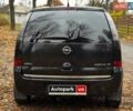 Черный Опель Мерива, объемом двигателя 1.6 л и пробегом 262 тыс. км за 4740 $, фото 10 на Automoto.ua