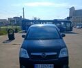 Черный Опель Мерива, объемом двигателя 1.7 л и пробегом 270 тыс. км за 3400 $, фото 1 на Automoto.ua