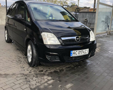 Черный Опель Мерива, объемом двигателя 1.25 л и пробегом 197 тыс. км за 3650 $, фото 3 на Automoto.ua