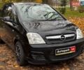 Черный Опель Мерива, объемом двигателя 1.6 л и пробегом 262 тыс. км за 4740 $, фото 3 на Automoto.ua
