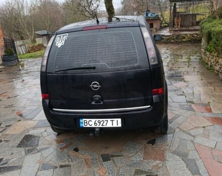 Черный Опель Мерива, объемом двигателя 1.6 л и пробегом 204 тыс. км за 3800 $, фото 2 на Automoto.ua
