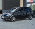 Черный Опель Мерива, объемом двигателя 1.7 л и пробегом 270 тыс. км за 2999 $, фото 1 на Automoto.ua