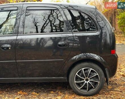 Черный Опель Мерива, объемом двигателя 1.6 л и пробегом 262 тыс. км за 4740 $, фото 13 на Automoto.ua