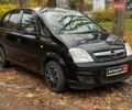 Черный Опель Мерива, объемом двигателя 1.6 л и пробегом 262 тыс. км за 4740 $, фото 4 на Automoto.ua