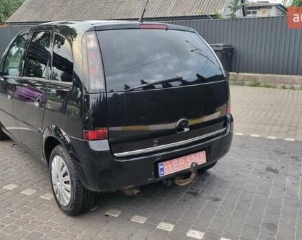 Черный Опель Мерива, объемом двигателя 1.6 л и пробегом 212 тыс. км за 4900 $, фото 5 на Automoto.ua