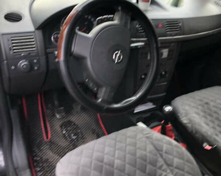 Черный Опель Мерива, объемом двигателя 1.25 л и пробегом 197 тыс. км за 3650 $, фото 8 на Automoto.ua