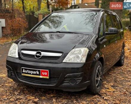 Черный Опель Мерива, объемом двигателя 1.6 л и пробегом 262 тыс. км за 4740 $, фото 1 на Automoto.ua