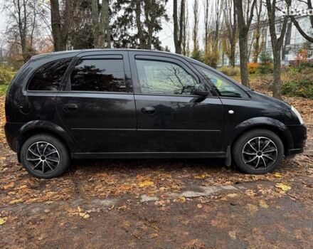 Черный Опель Мерива, объемом двигателя 1.6 л и пробегом 262 тыс. км за 4740 $, фото 6 на Automoto.ua