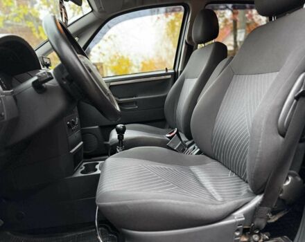 Черный Опель Мерива, объемом двигателя 1.6 л и пробегом 262 тыс. км за 4740 $, фото 22 на Automoto.ua