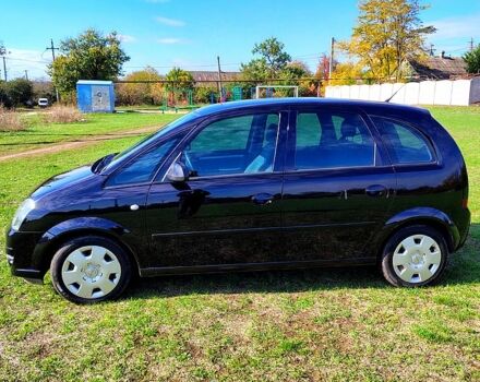 Черный Опель Мерива, объемом двигателя 1.4 л и пробегом 184 тыс. км за 5000 $, фото 3 на Automoto.ua