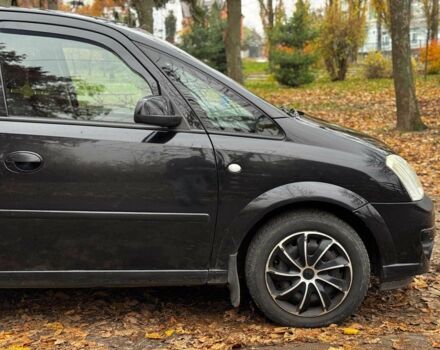 Черный Опель Мерива, объемом двигателя 1.6 л и пробегом 262 тыс. км за 4740 $, фото 5 на Automoto.ua