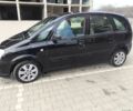 Черный Опель Мерива, объемом двигателя 1.7 л и пробегом 240 тыс. км за 3900 $, фото 1 на Automoto.ua