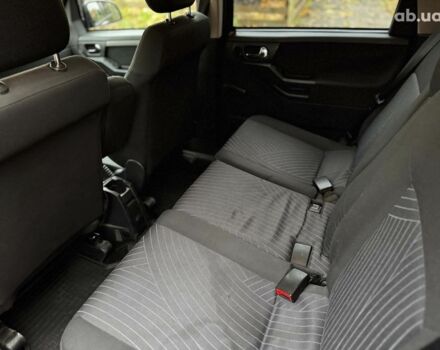 Черный Опель Мерива, объемом двигателя 1.6 л и пробегом 262 тыс. км за 4740 $, фото 18 на Automoto.ua