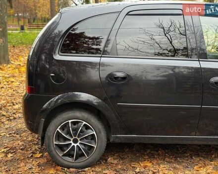 Черный Опель Мерива, объемом двигателя 1.6 л и пробегом 262 тыс. км за 4740 $, фото 7 на Automoto.ua