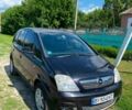 Черный Опель Мерива, объемом двигателя 1.6 л и пробегом 300 тыс. км за 3696 $, фото 1 на Automoto.ua