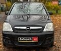 Черный Опель Мерива, объемом двигателя 1.6 л и пробегом 262 тыс. км за 4740 $, фото 2 на Automoto.ua