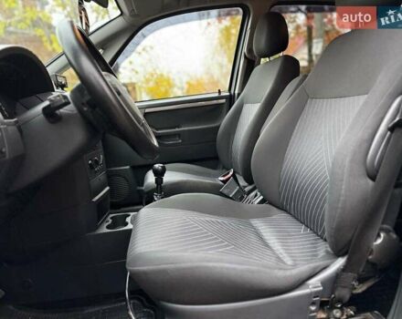 Черный Опель Мерива, объемом двигателя 1.6 л и пробегом 262 тыс. км за 4740 $, фото 22 на Automoto.ua