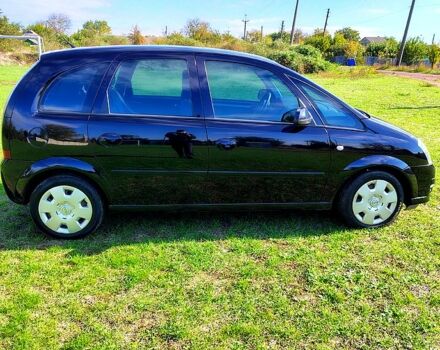 Черный Опель Мерива, объемом двигателя 1.4 л и пробегом 184 тыс. км за 5000 $, фото 4 на Automoto.ua