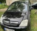 Черный Опель Мерива, объемом двигателя 1.6 л и пробегом 147 тыс. км за 4950 $, фото 1 на Automoto.ua